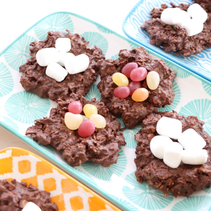Chocolate Easter Egg Nests filled with jelly beans and marshmallows on a tray