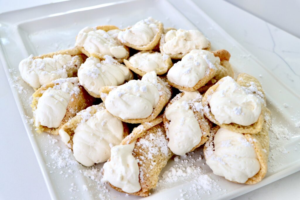 Easter Lily Dessert filled with whipped cream on a white tray