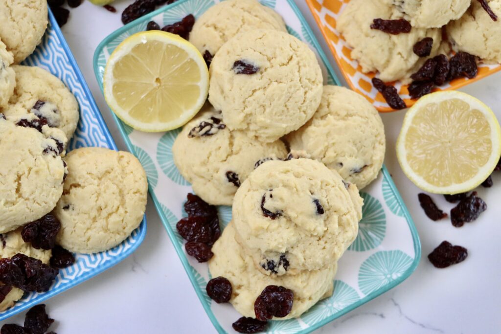Lemon Cherry Cookies on 3 trays accented with dried cherries and lemons