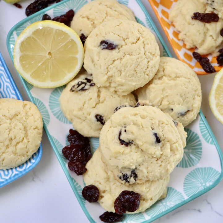 Lemon Cherry Cookies on 3 trays accented with dried cherries and lemons
