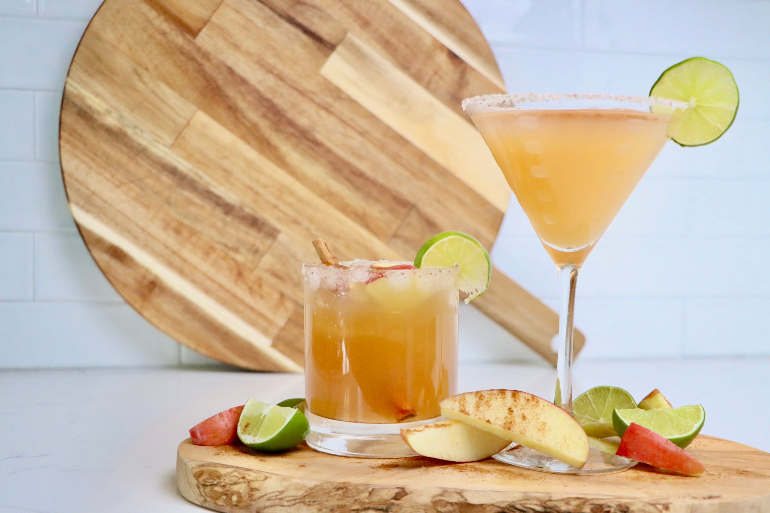 Apple Cider Margaritas displayed on a cutting board