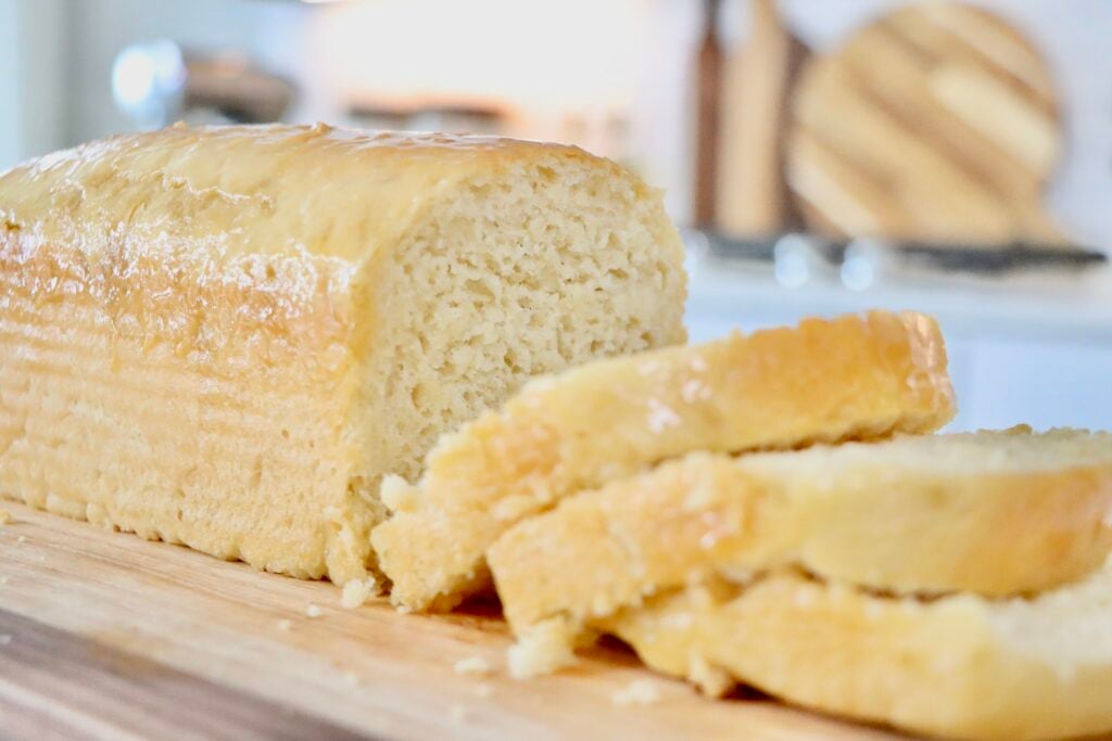 Soft and fluffy slices of sourdough Hawaiian bread showing airy texture and golden crust.