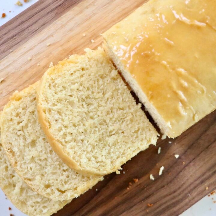Soft and fluffy slices of sourdough Hawaiian bread showing airy texture and golden crust.