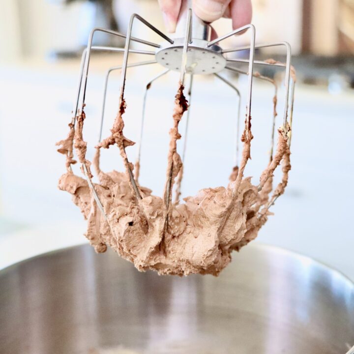 Chocolate Buttercream Frosting in a mixing beater