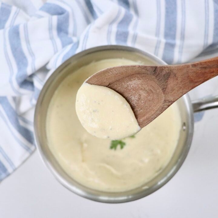 Easy homemade Alfredo sauce from scratch in a saucepan, thick and creamy, perfect for pasta, chicken, or shrimp dishes.