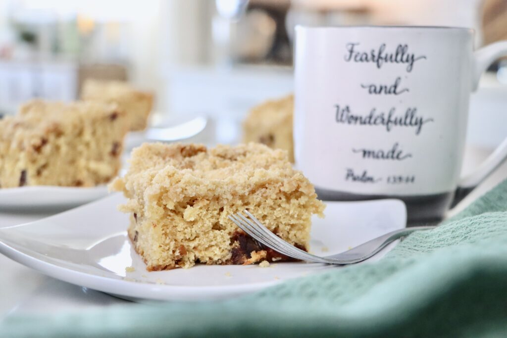 Homemade date coffee cake with chopped dates and soft tender crumb, fresh from the oven.