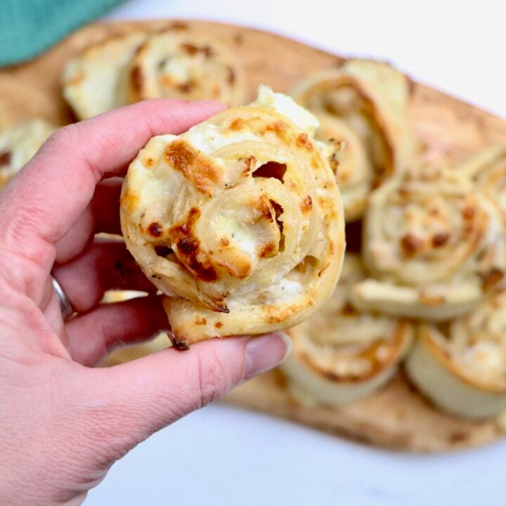 Golden sourdough chicken alfredo pizza rolls with melted mozzarella and parmesan cheese, baked to perfection.
