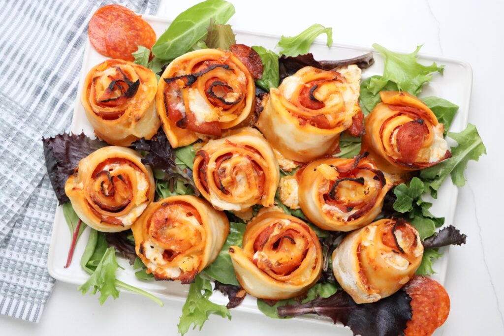 Sourdough pepperoni pizza rolls baked until golden brown with melted cheese on top