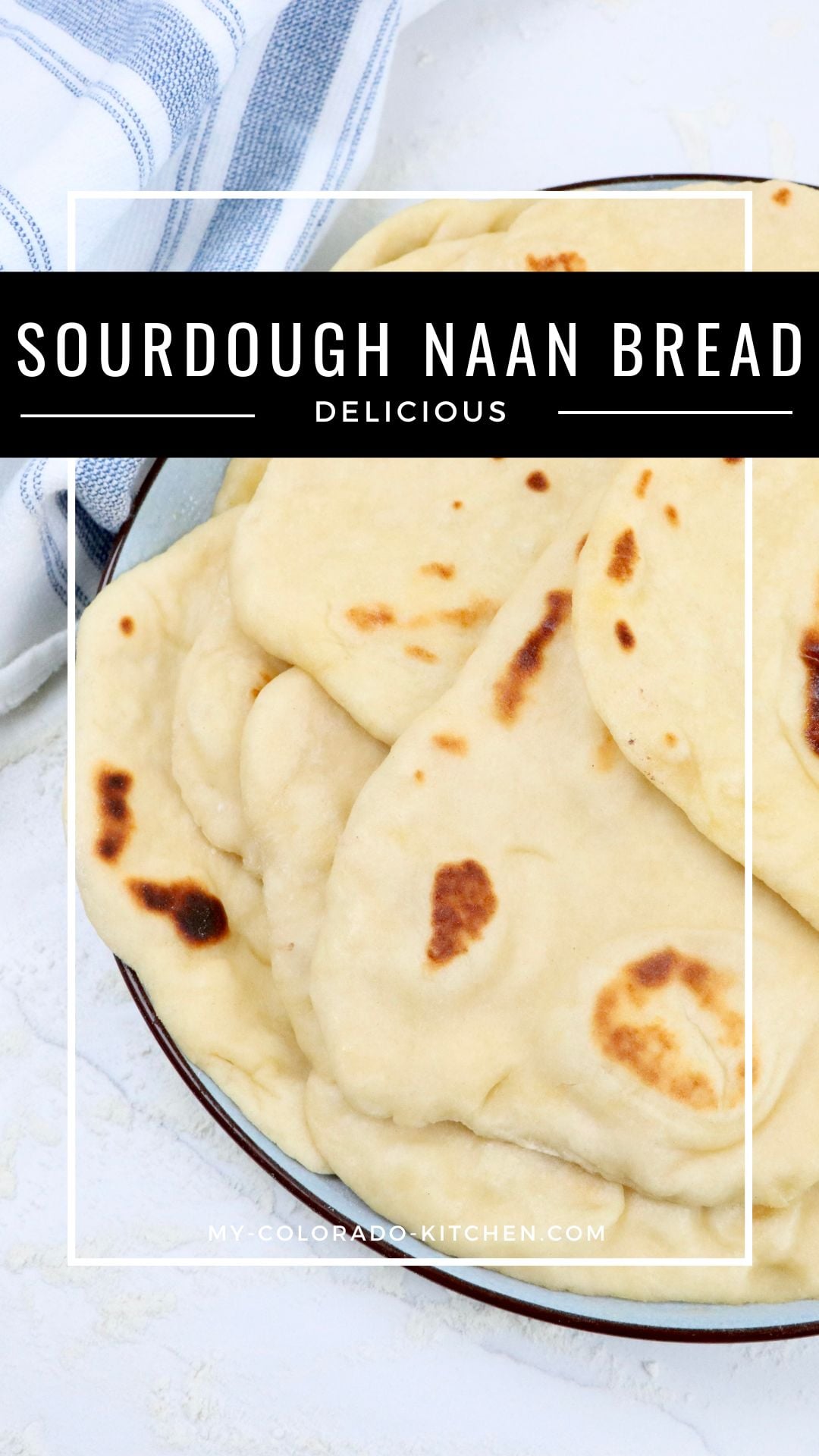 Stack of soft and chewy sourdough naan bread brushed with melted butter