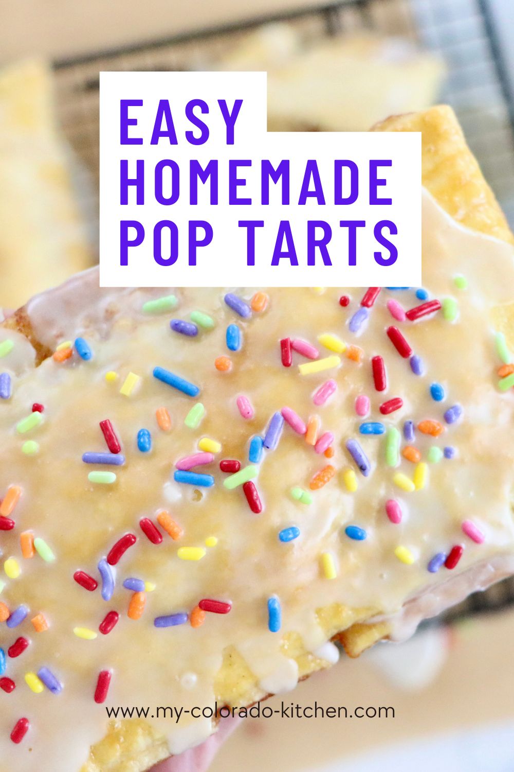 Close up of homemade pop tarts filled with berry jam, drizzled with glaze, made from scratch with real ingredients.