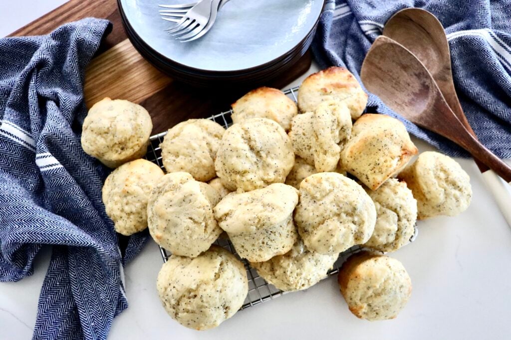 Sourdough discard poppy seed muffins with tall bakery-style tops, soft and fluffy texture, made from scratch with real ingredients