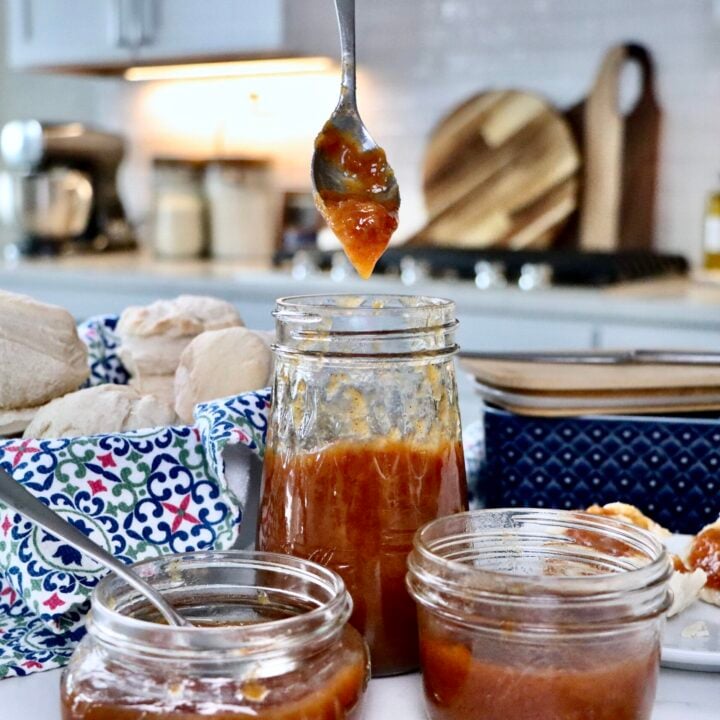 Small batch cinnamon peach jam in jars with warm spices and fresh peach flavor