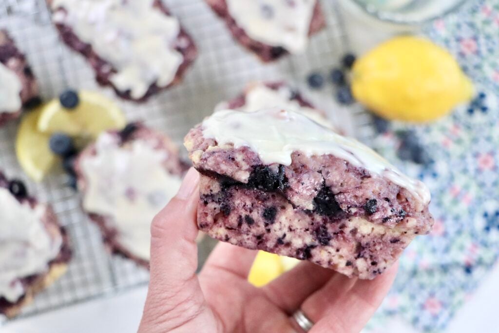 Soft and tender blueberry lemon quick bread with a bright lemon glaze and fresh blueberries.