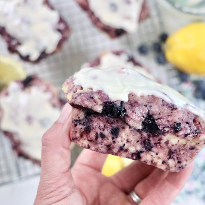 Soft and tender blueberry lemon quick bread with a bright lemon glaze and fresh blueberries.