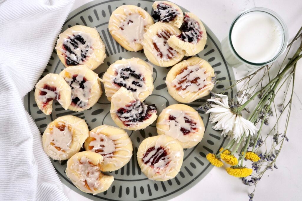 Close up of homemade jam-filled kolaches made from scratch with soft yeast dough and fruit filling
