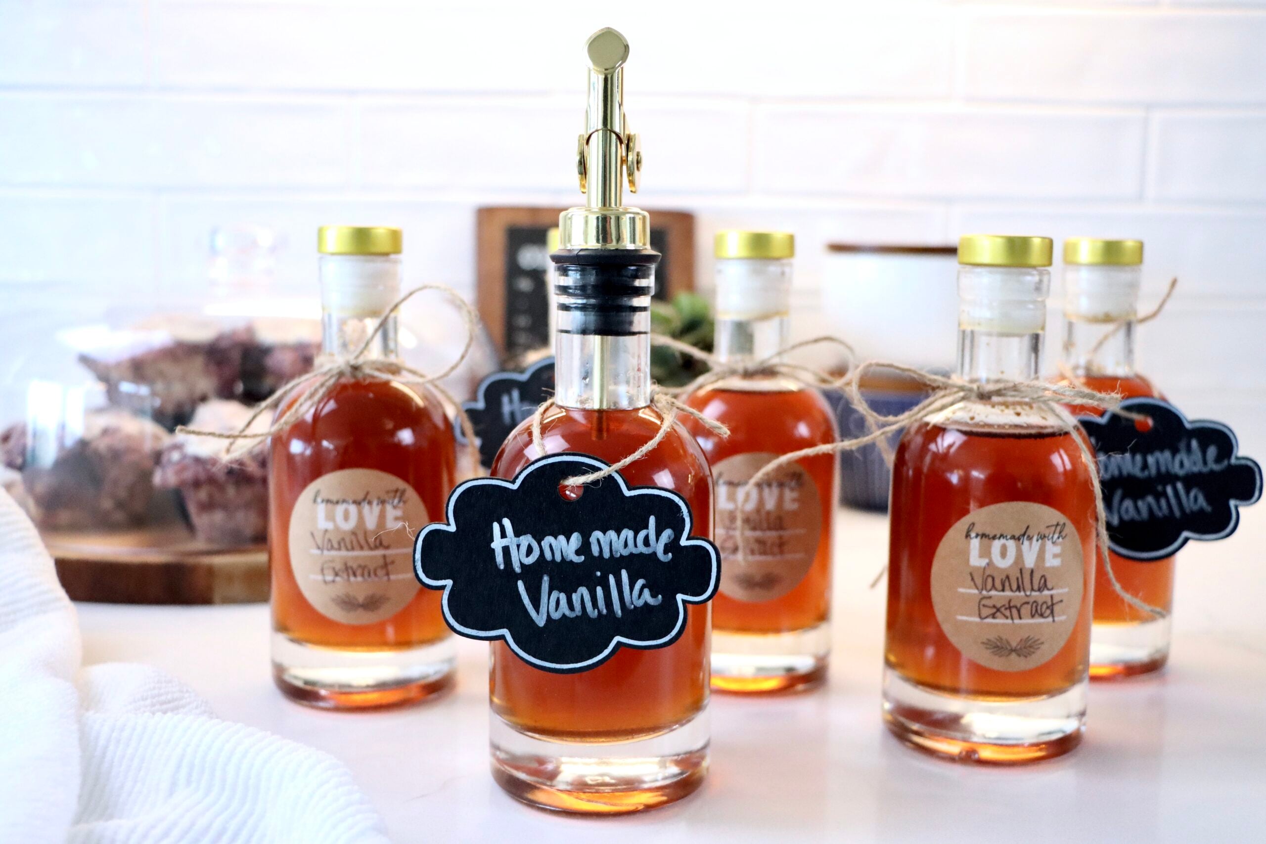 Easy homemade vanilla extract recipe using just vodka and vanilla beans for rich baking flavor.