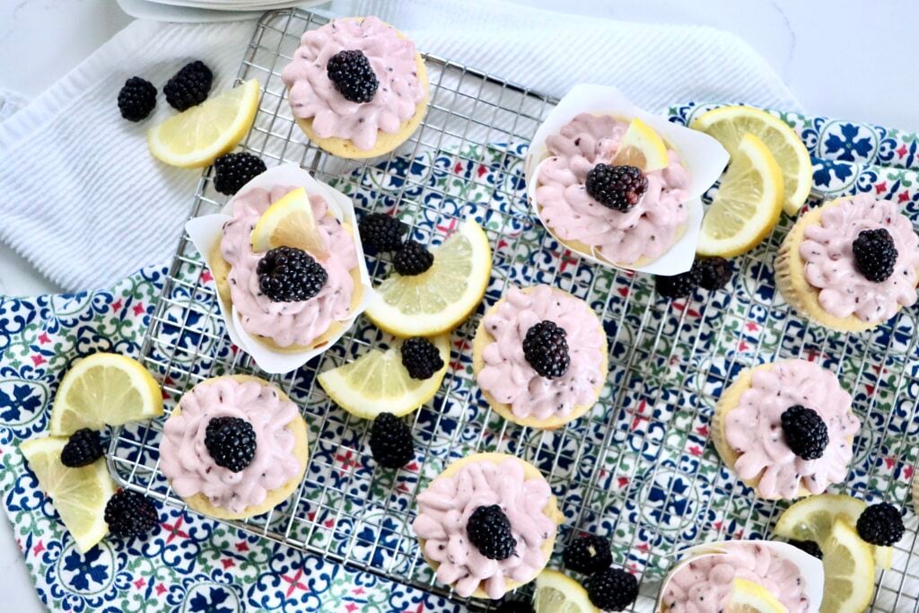 Bakery-style lemon blackberry cupcakes with rich blackberry cream cheese frosting and lemon zest.
