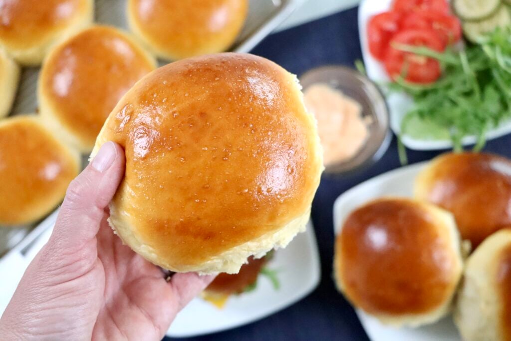 Easy homemade hamburger buns with a soft fluffy texture perfect for burgers and sandwiches