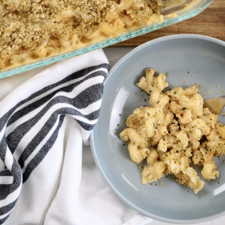 Creamy baked macaroni and cheese topped with Parmesan cheese and crispy Italian herb breadcrumbs.