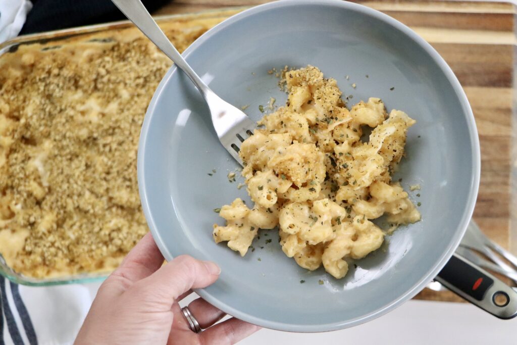 Creamy homemade mac and cheese with cheddar and Gruyere cheese baked until bubbly.