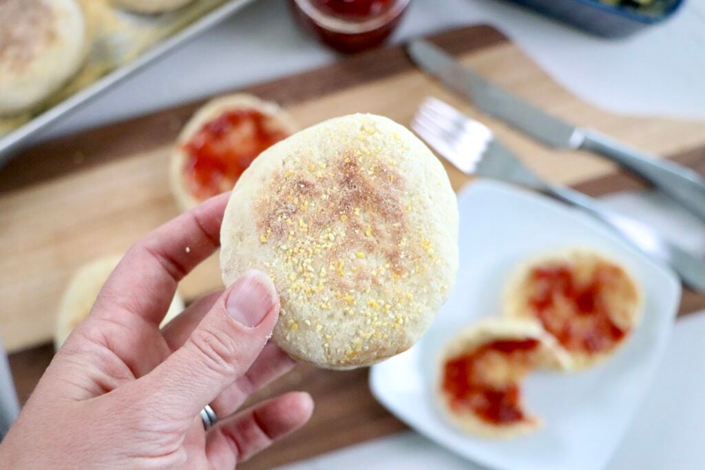 Freshly cooked sourdough discard English muffins with golden, crisp edges.
