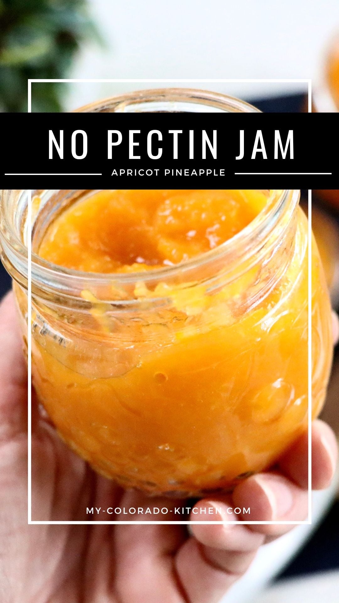 Close Up of a Glass jar of homemade apricot pineapple jam