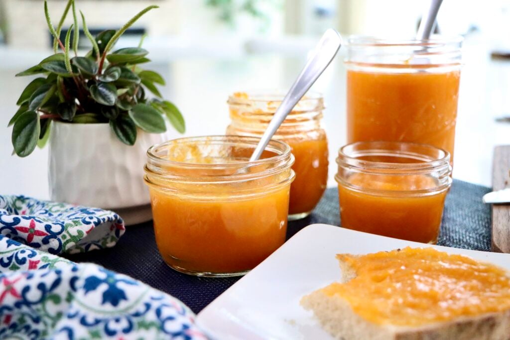 Glass jar of homemade apricot pineapple jam