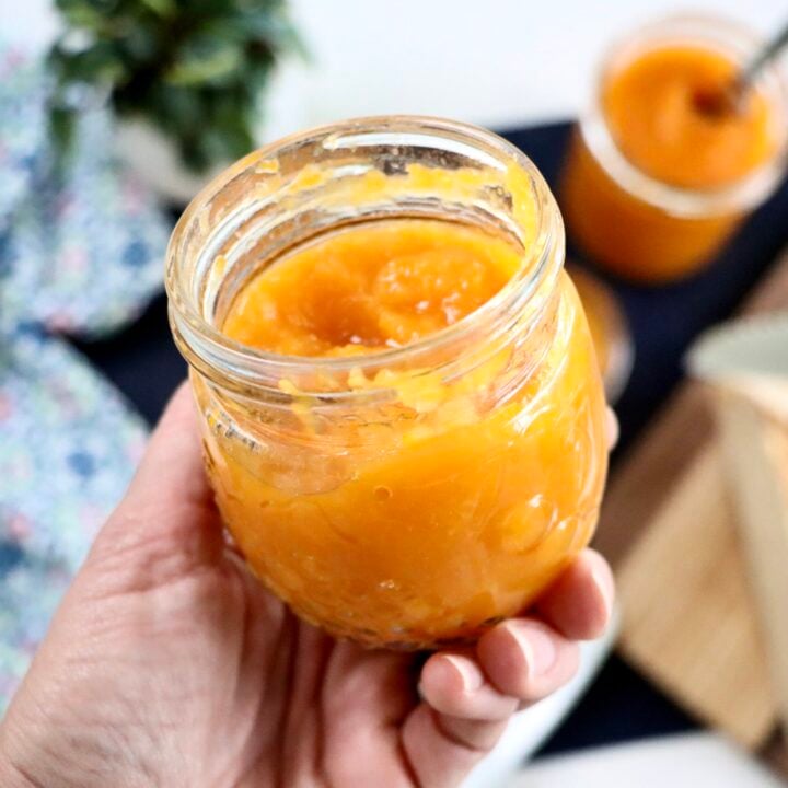 Glass jar of homemade apricot pineapple jam