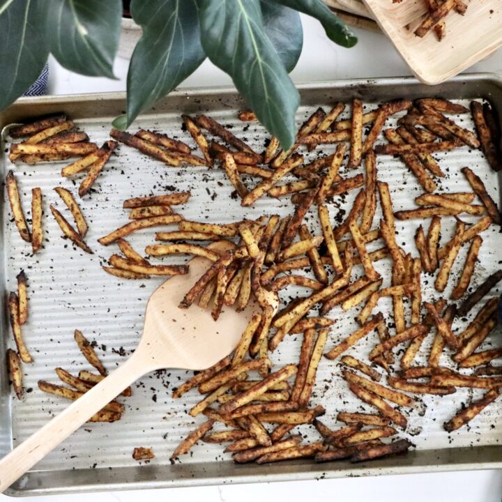 Yellow potato fries seasoned with chili powder and paprika, baked until crispy