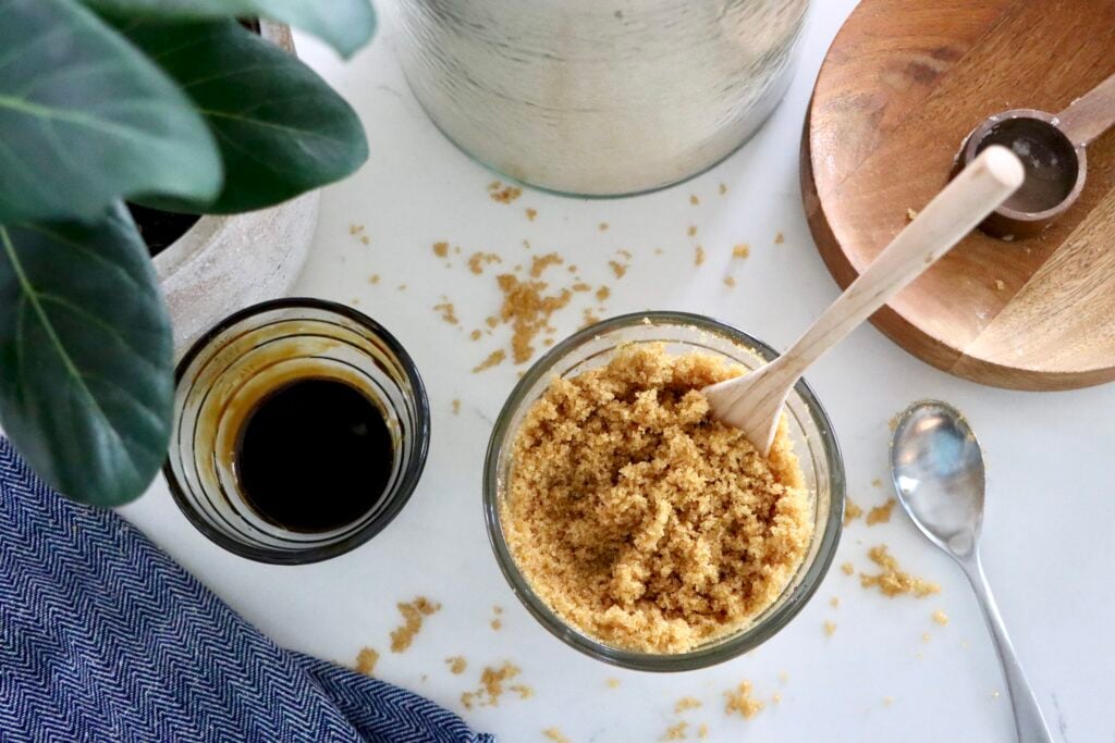 Light brown sugar mixture in a bowl after combining sugar and molasses