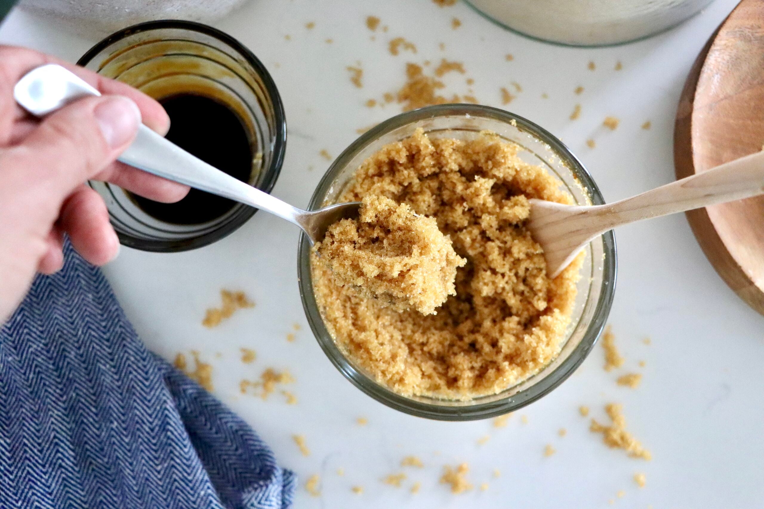 Bowl of fluffy homemade brown sugar made with sugar and molasses