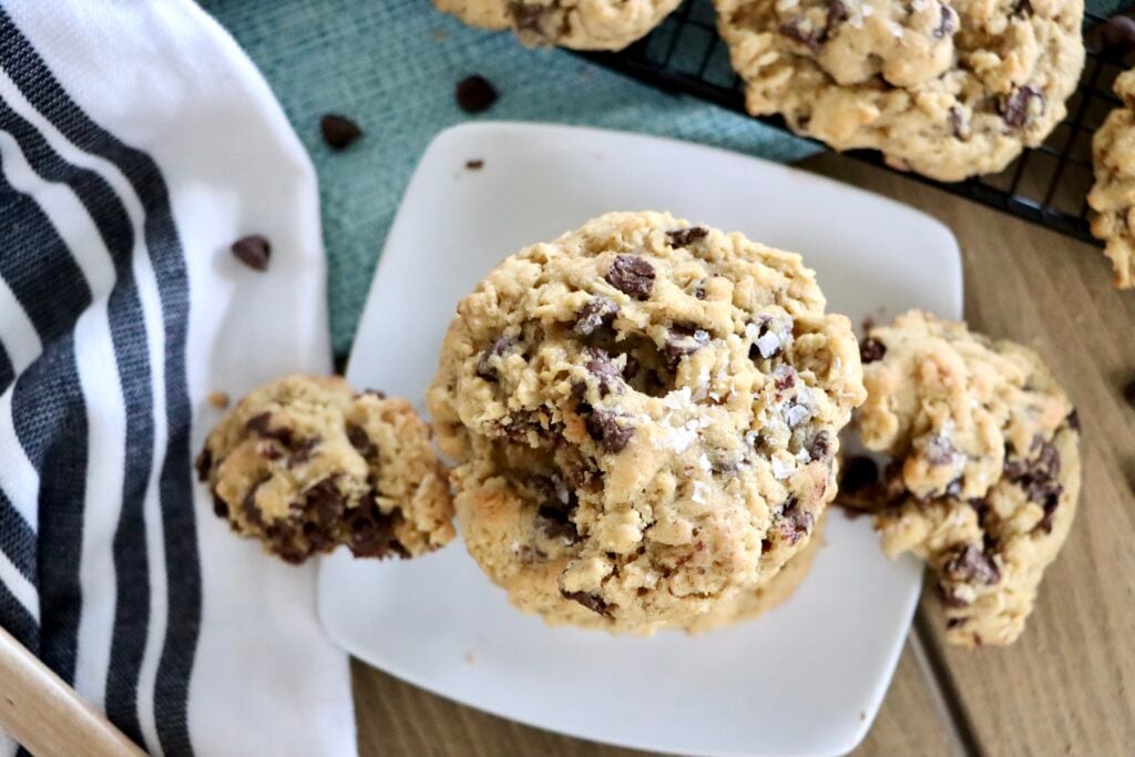 Fresh-baked oatmeal chocolate chip cookies sprinkled with flaky salt