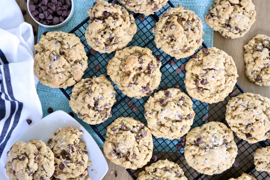 Oatmeal chocolate chip cookies cooling on a wire rack