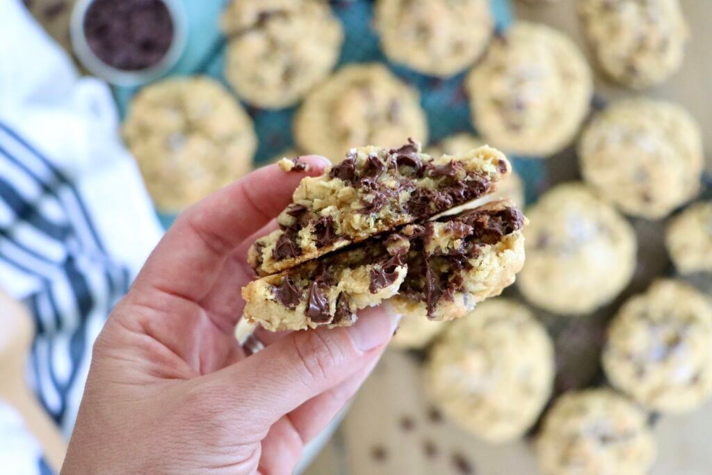 Close-up of a chewy oatmeal chocolate chip cookie with melted chocolate