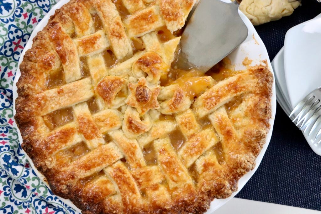 Overhead view of a deep-dish peach pie