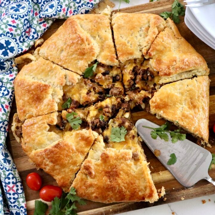 Taco galette filled with ground beef, corn, black beans, and cheddar cheese