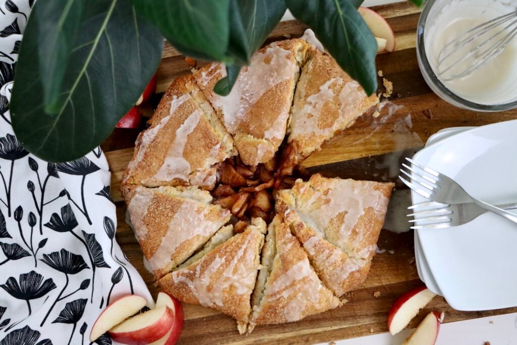 Rustic homemade apple galette with visible cinnamon-spiced apple slices