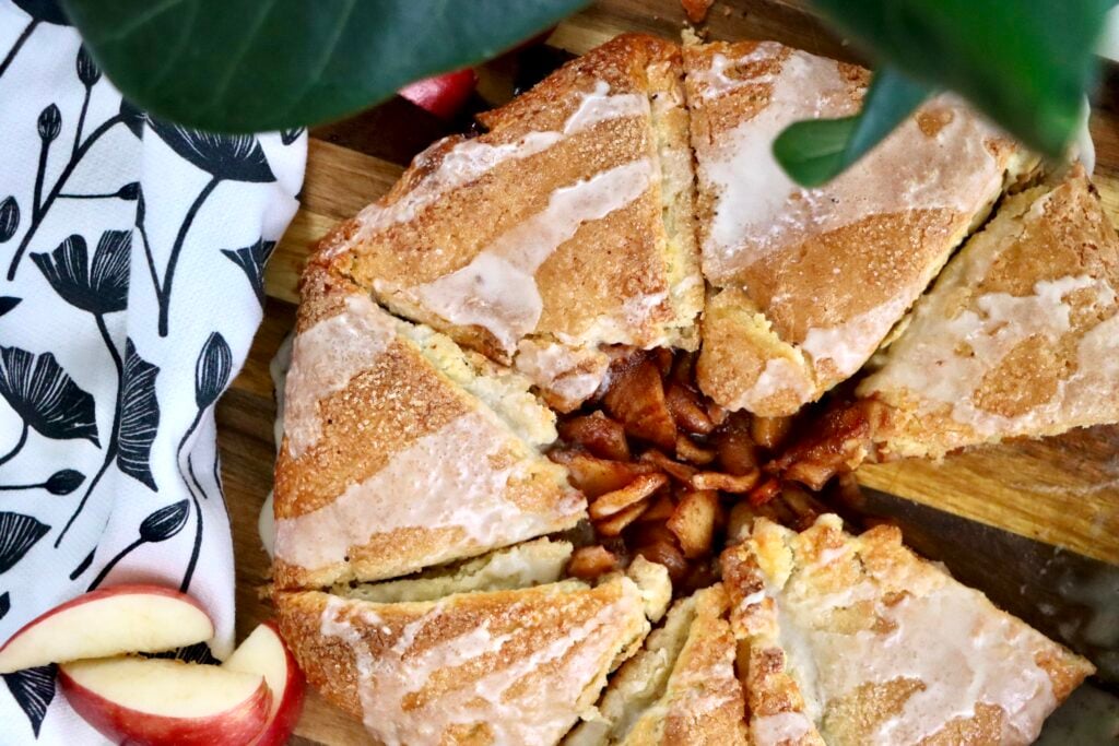 Overhead shot of a rustic apple galette topped with turbinado sugar