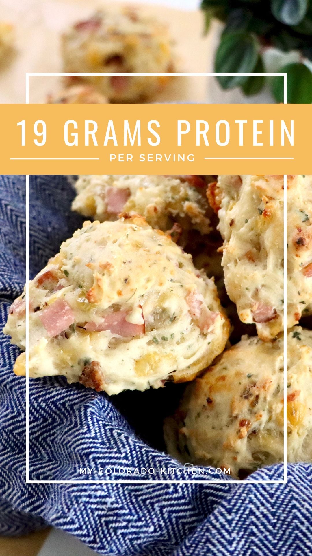 A pan of golden bacon cheddar sourdough discard biscuits fresh from the oven