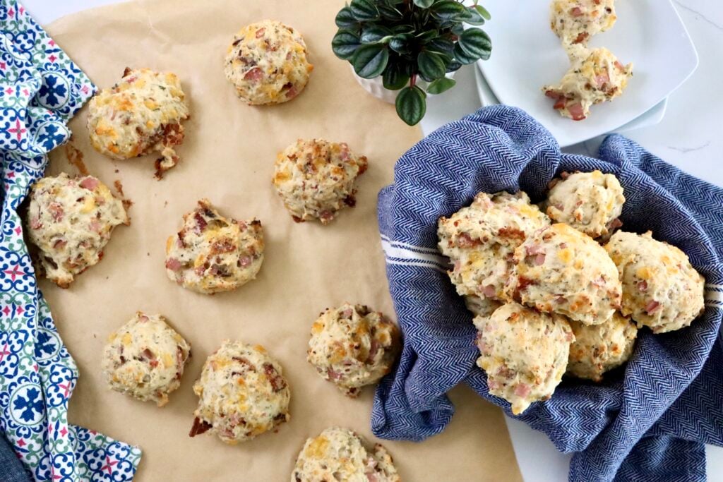 A stack of bacon cheddar sourdough discard biscuits