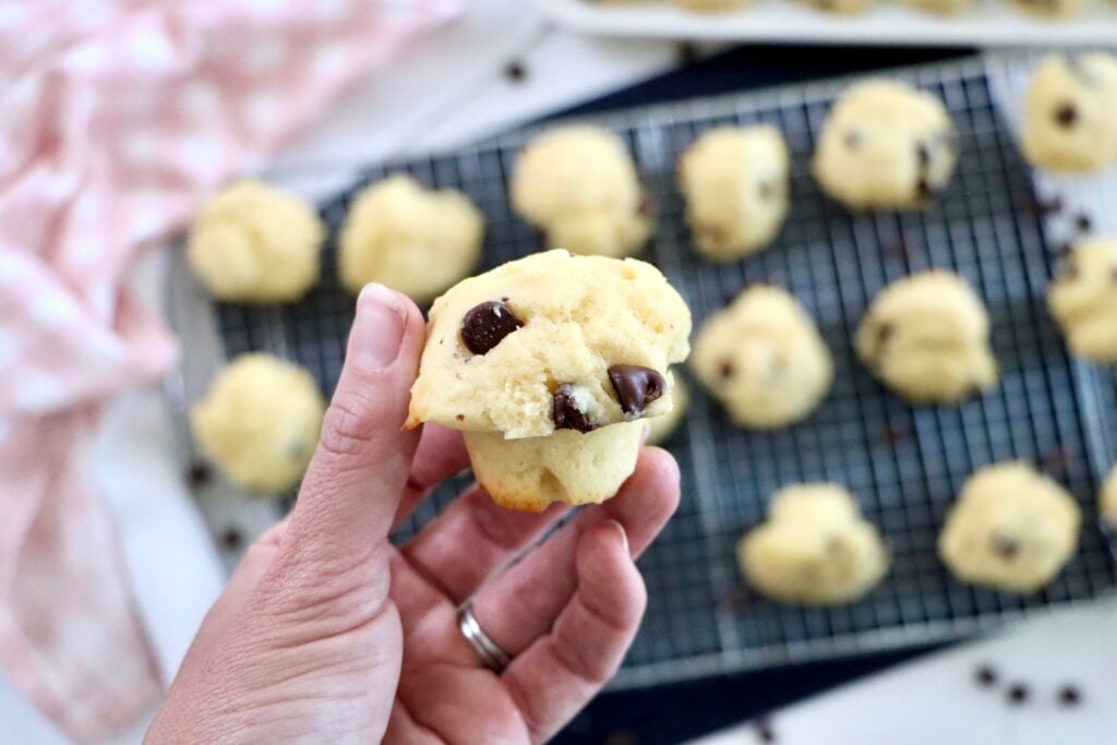 Close-up of a mini chocolate chip muffin showing a soft crumb